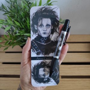 Bolígrafo y marcapáginas Eduardo Manostijeras